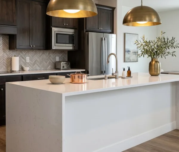 White quartz waterfall island herringbone backsplash Steamboat Springs